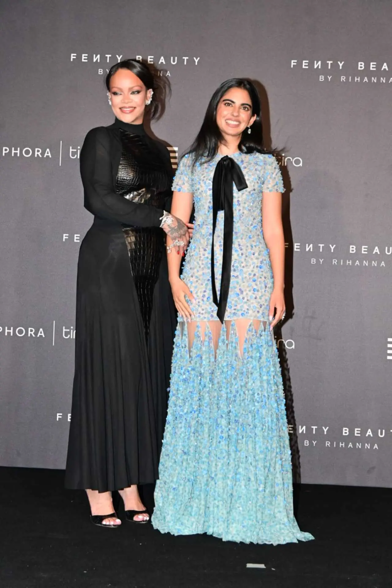 Rihanna was seen posing with Isha Ambani at the red carpet as the two smiled for the shutterbugs.